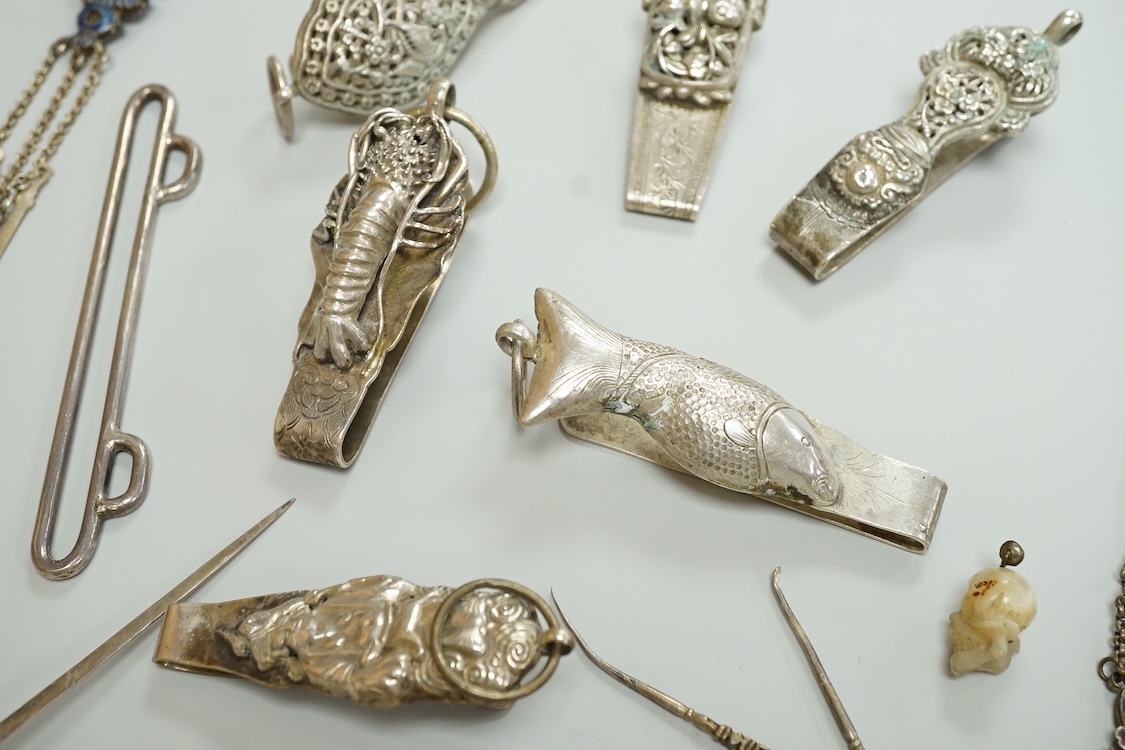 A collection of Chinese Straits white metal hooks, a chatelaine, South East Asian coinage and other items, etc.